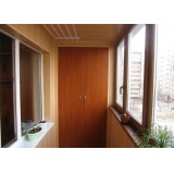 Остекление балкона ламинированными рамами с отделкой и шкафом